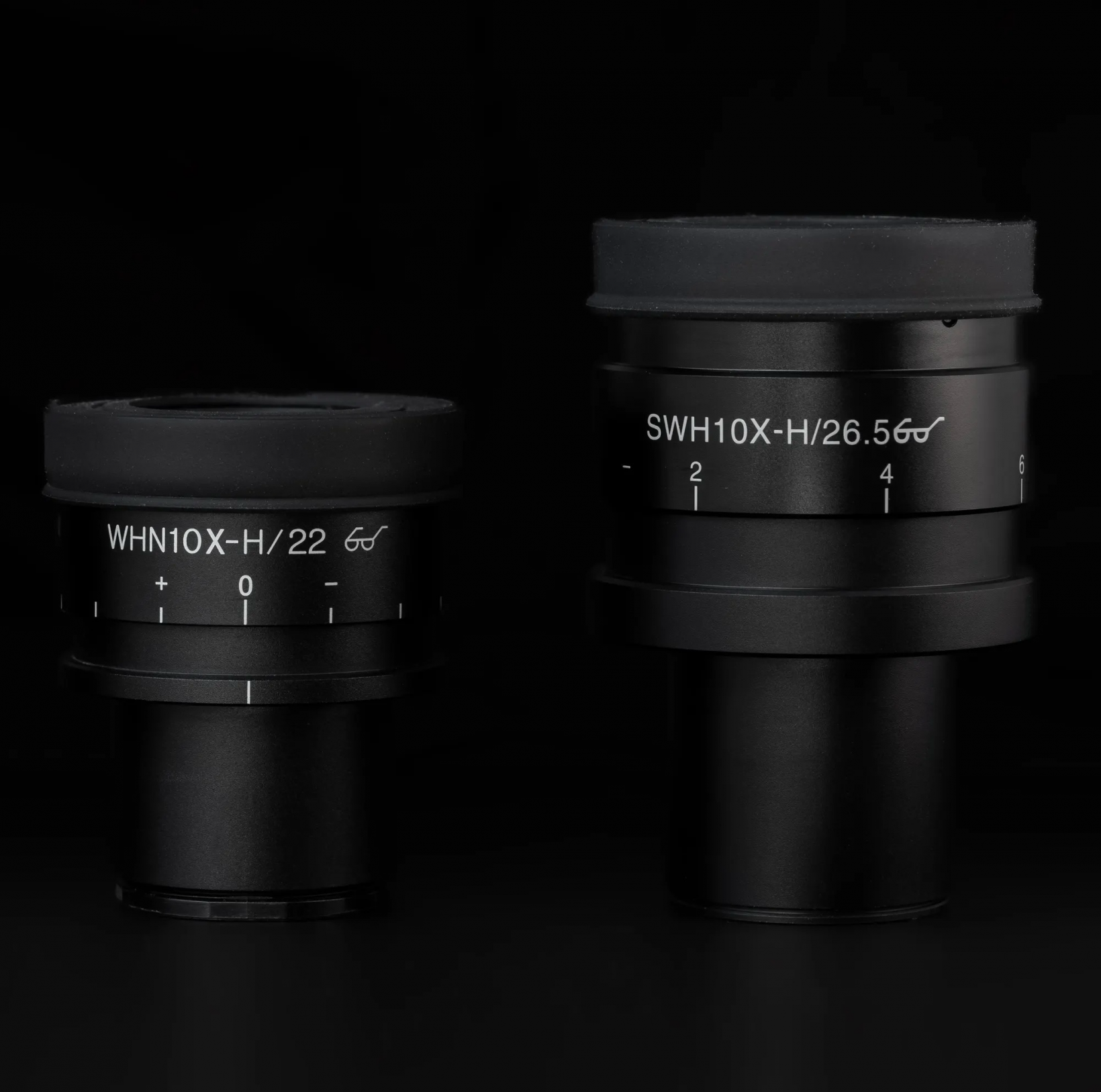 Physical difference between an FN22 ocular (left) and an FN26.5 ocular (right).